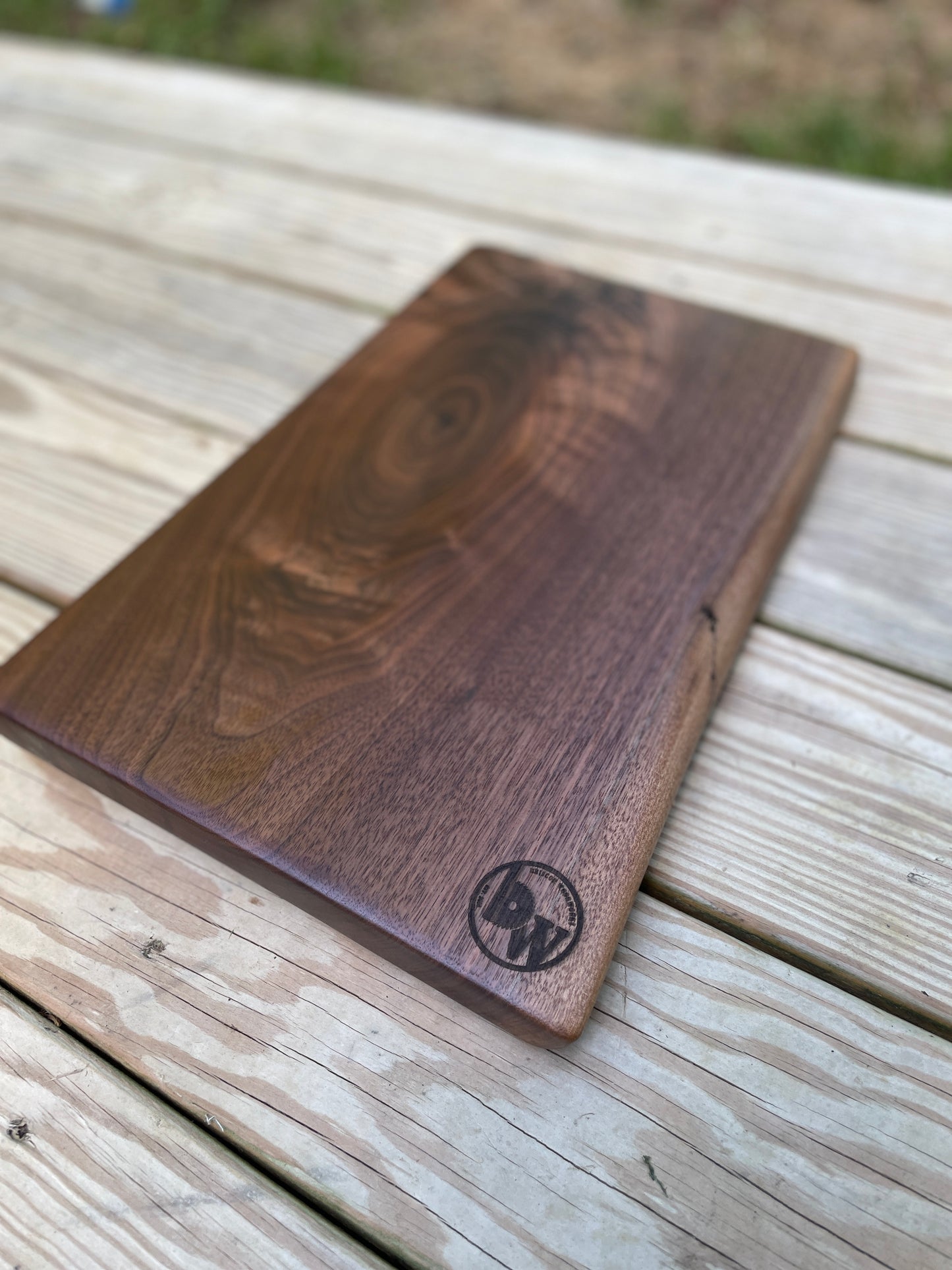 Walnut charcuterie board with knot